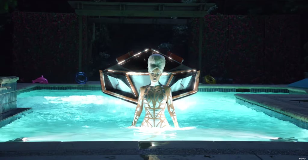 Alien Iggy, decked out in a silver embellished bodysuit.
