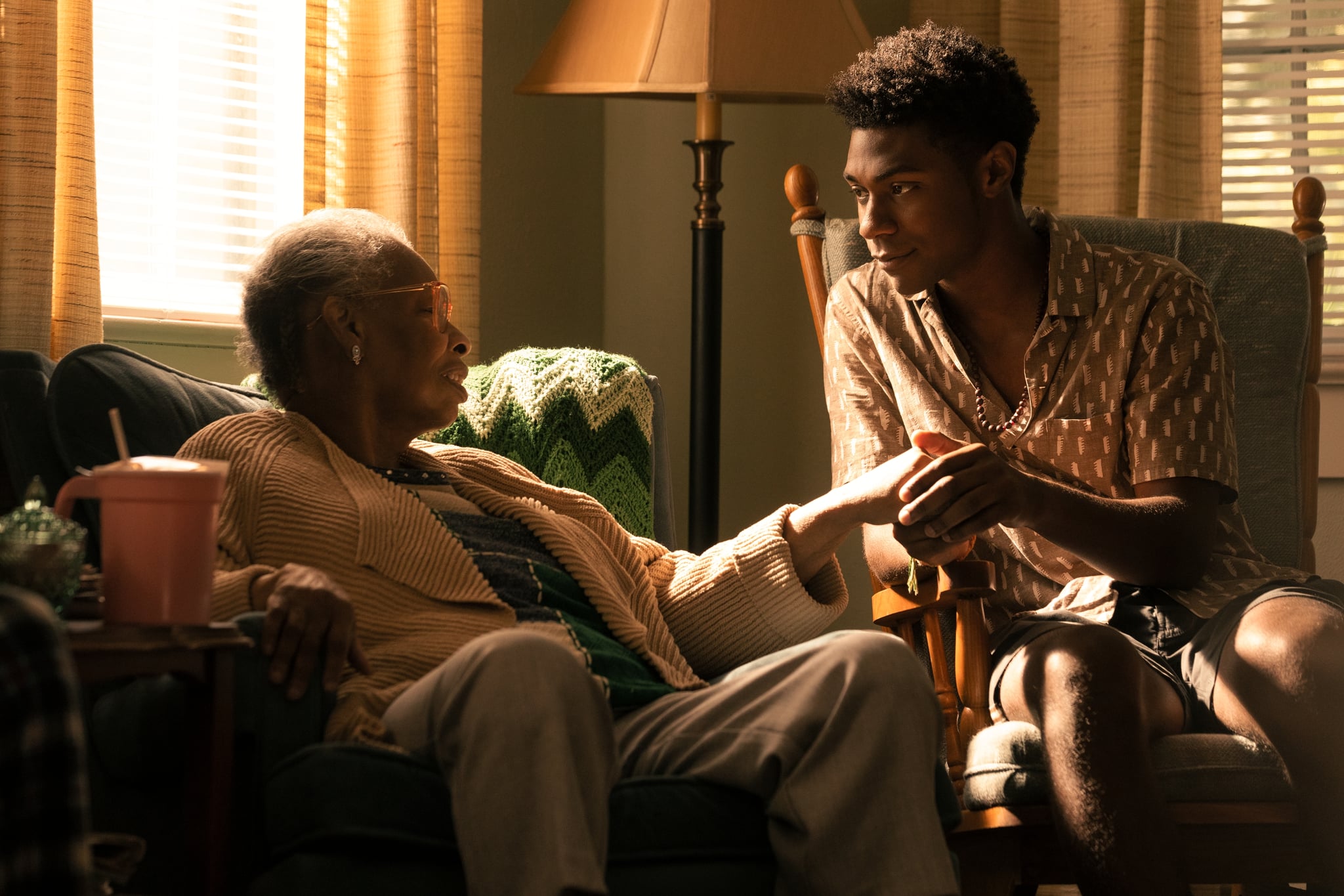 OUTER BANKS (L to R) CAROL SUTTON as ME-MAW and JONATHAN DAVISS as POPE in episode 206 of OUTER BANKS Cr. JACKSON LEE DAVIS/NETFLIX  2021