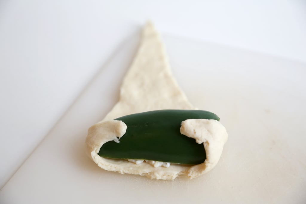 Fold 2 Corners of the Dough Over the Pepper