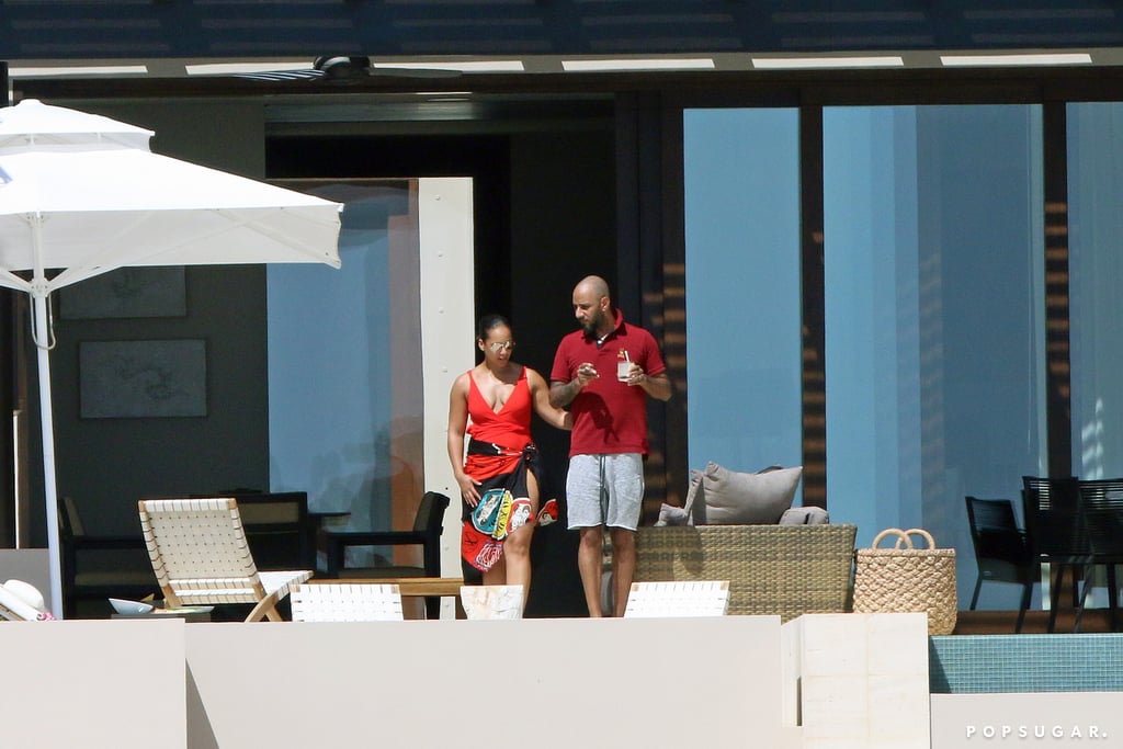 Alicia Keys Wearing a Red Swimsuit