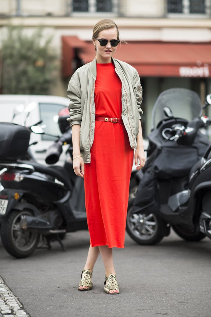 Make sure bold red really stands out by pairing it with soft neutrals, like this red dress accented with beige.