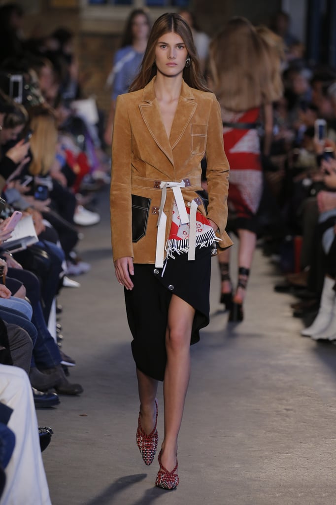 For Fall, Amal might want to add to her outerwear collection, and we're picking this suede brown jacket for her. It can be worn with a skirt or flared jeans.