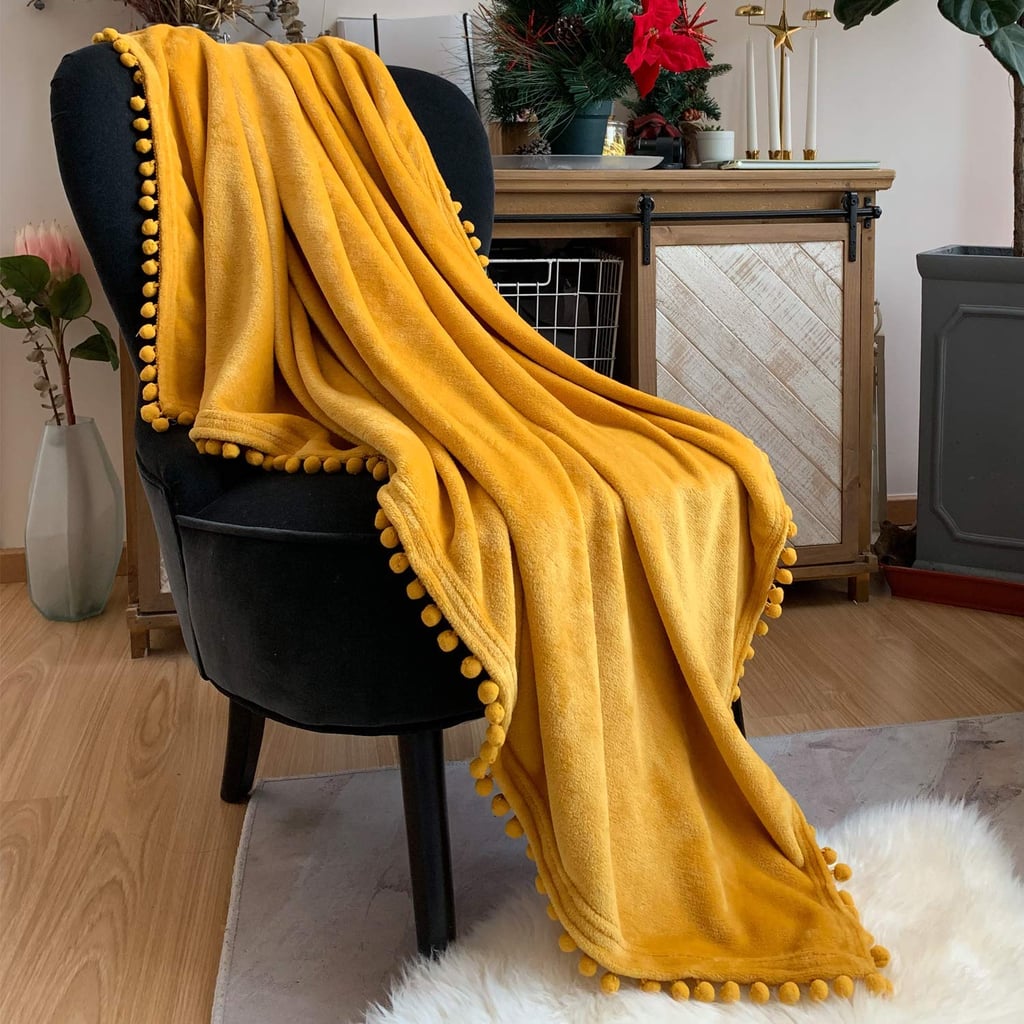 Flannel Blanket With Pom Pom Fringe