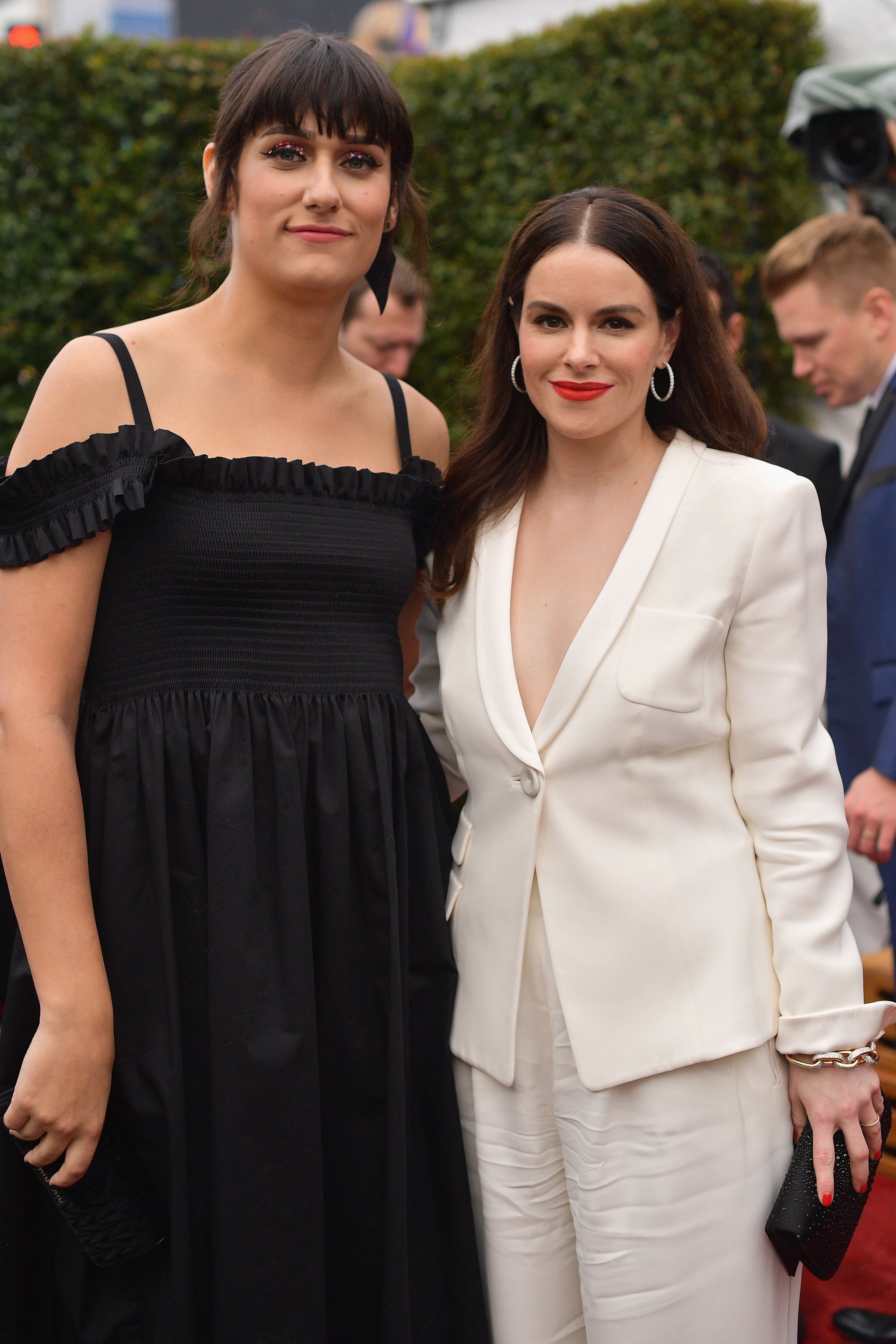 LOS ANGELES, CA - FEBRUARY 10: Teddy Geiger (L) and Emily Hampshire attend the 61st Annual GRAMMY Awards at Staples Centre on February 10, 2019 in Los Angeles, California.  (Photo by Matt Winkelmeyer/Getty Images for The Recording Academy)