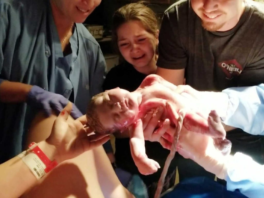 8-Year-Old Helps Deliver Baby Sister