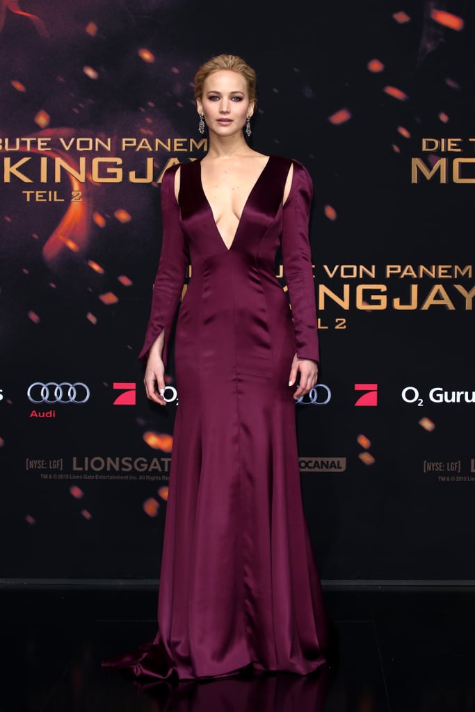 Jennifer Lawrence turned up the wow factor with a plunging neckline and cutout sleeves in her burgundy Dior Couture gown.