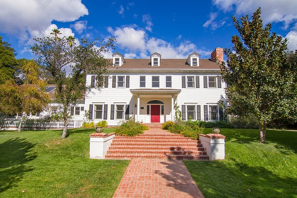 The house is beautiful on the outside. We only wish we could peek inside to see how Emily and John remodeled the kitchen!