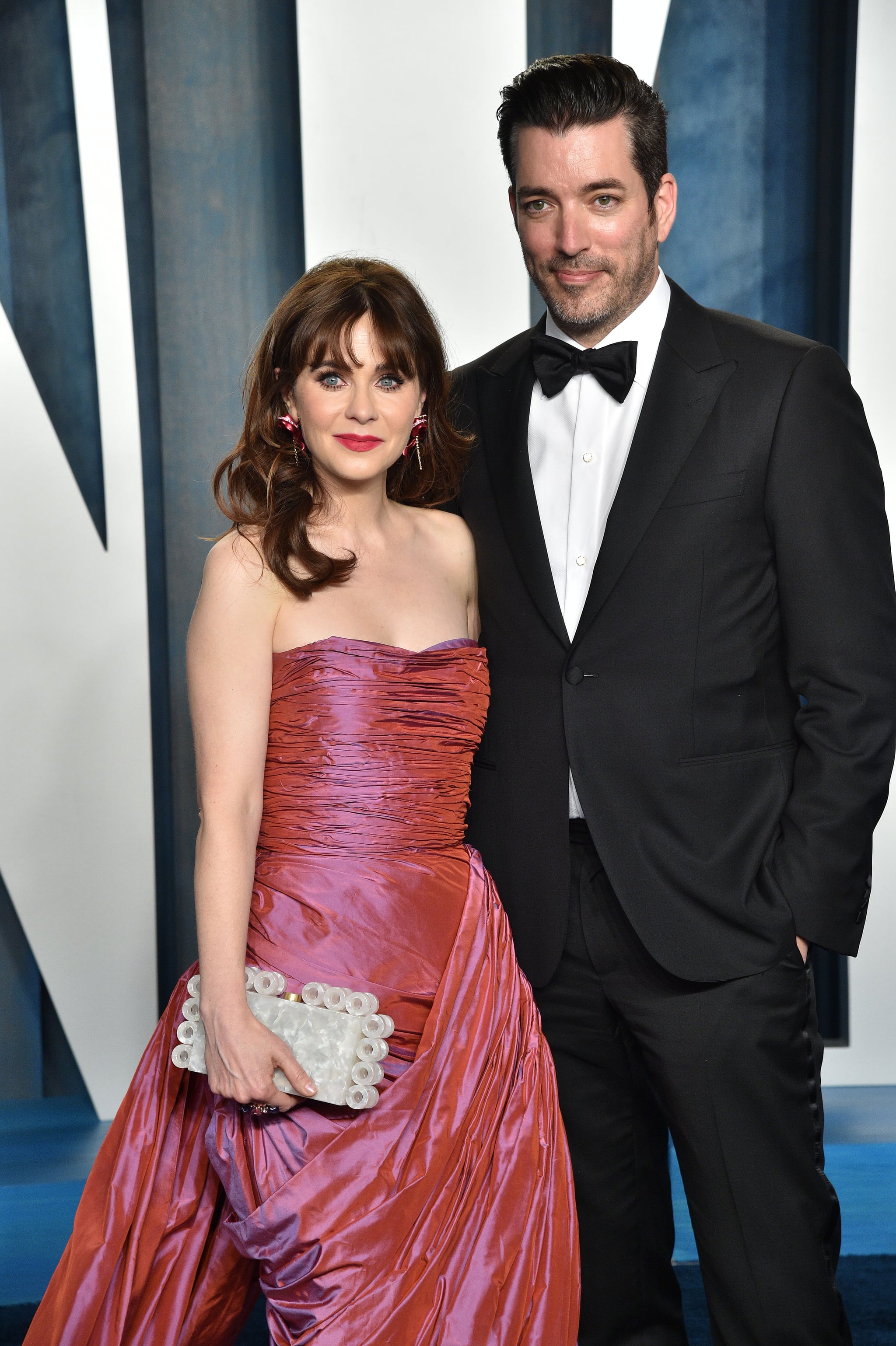 BEVERLY HILLS, CALIFORNIA - MARCH 27: Zooey Deschanel and Jonathan Scott attend the 2022 Vanity Fair Oscar Party hosted by Radhika Jones at Wallis Annenberg Centre for the Performing Arts on March 27, 2022 in Beverly Hills, California. (Photo by Lionel Hahn/Getty Images)