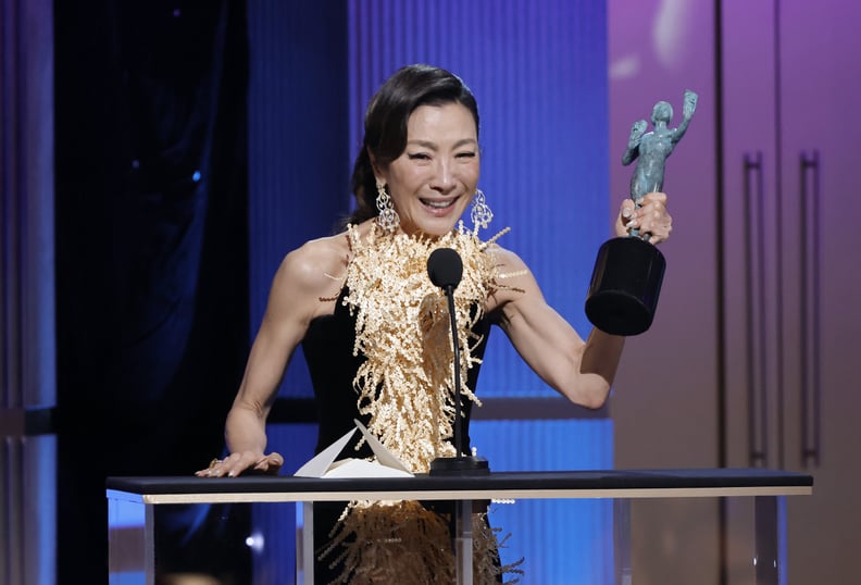 LOS ANGELES, CALIFORNIA - FEBRUARY 26: Michelle Yeoh accepts the Outstanding Performance by a Female Actor in a Leading Role for 