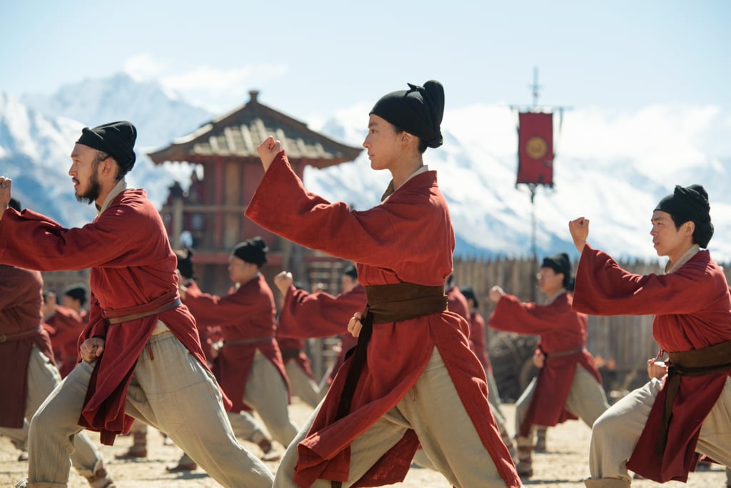 Training in a red and beige outfit.