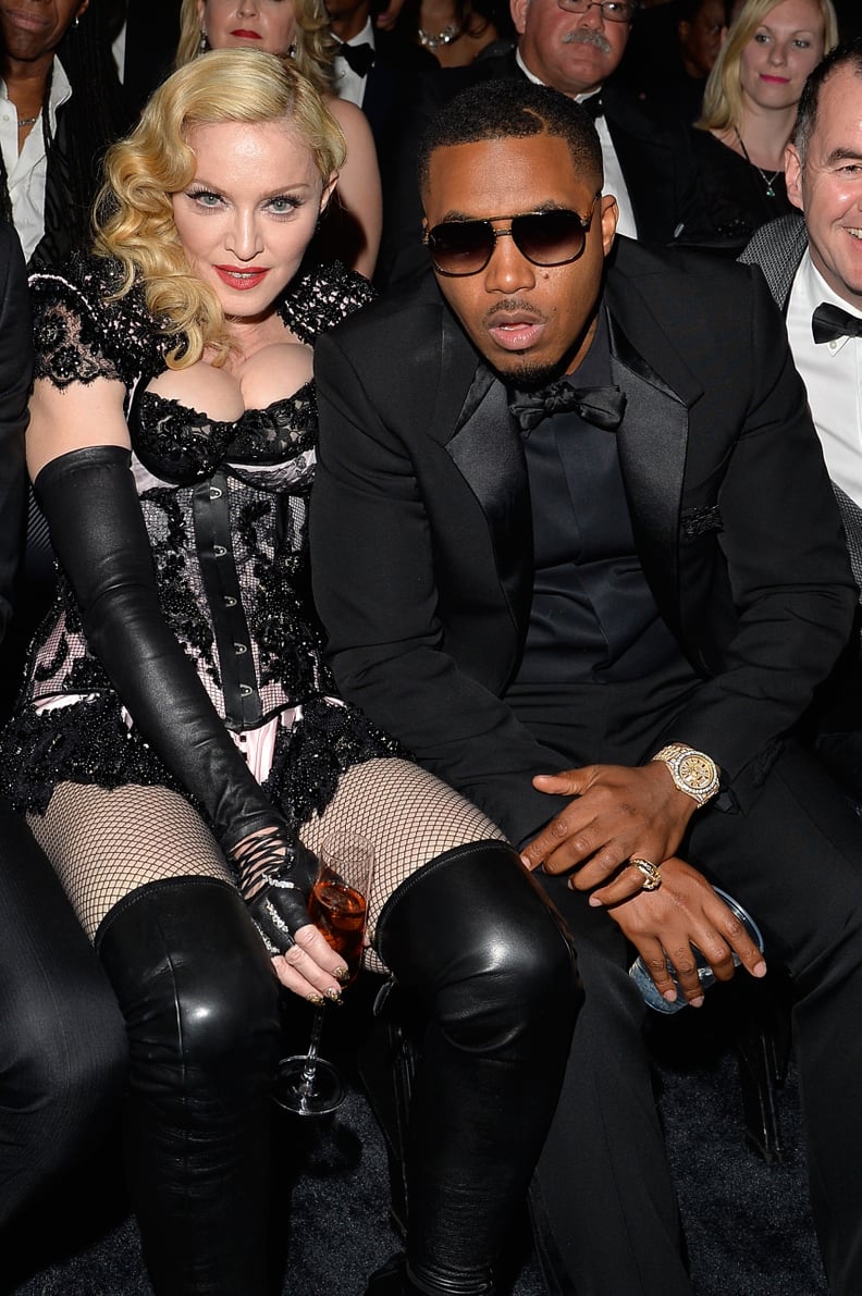 She sat next to Nas during the show.