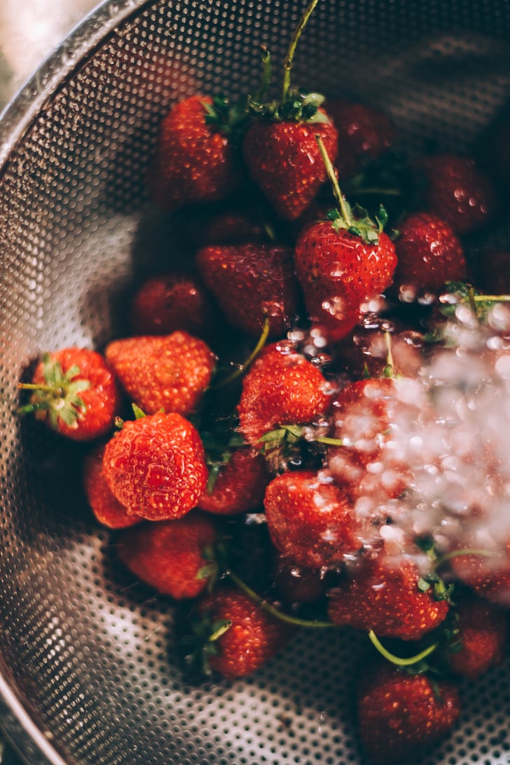 Soak strawberries in water with a few tablespoons of apple cider