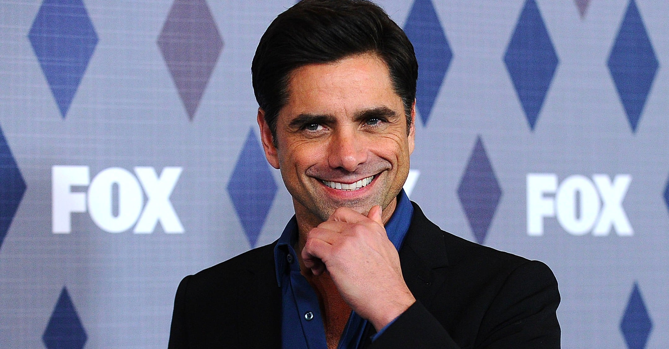 Photos of John Stamos Through the Years | POPSUGAR Celebrity