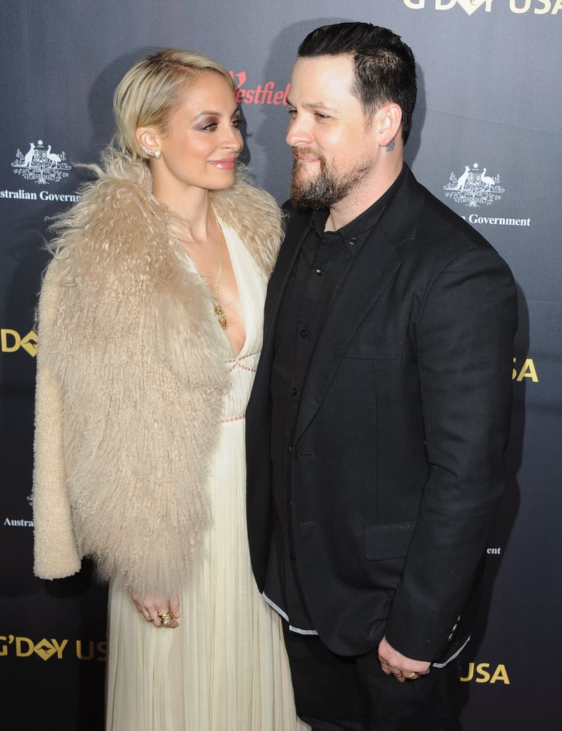 On why their relationship works: "We just get each other. We're both laid-back people. It's never been a job to be in this relationship."
On Nicole's past: "She made some mistakes, but look at where we're from: I'm in a rock and roll band. Nicole is who she is."

On how many times he asked Nicole to marry him: "People don't know this, but I asked her to marry me 10 times before she actually said yes. I was asking every other Tuesday."
  
On how he asked for her hand in marriage: "I hinted around at it and she's not one to beg anyone for anything, so every time I'd kind of hint she was always so nonchalant like she was cool. She doesn't want any handouts, so I was always so confused. I was waiting for her to say, 'When are you going to ask?' and that's not the kind of woman she is. She keeps you on your toes for sure." 
On when Joel finally proprosed to Nicole: "It was a Tuesday. I just woke up one morning and said, 'You know, we have two kids already,' and I was just like, 'What am I doing? I'm a fool. Why haven't I asked her to marry me?' and did it that night."