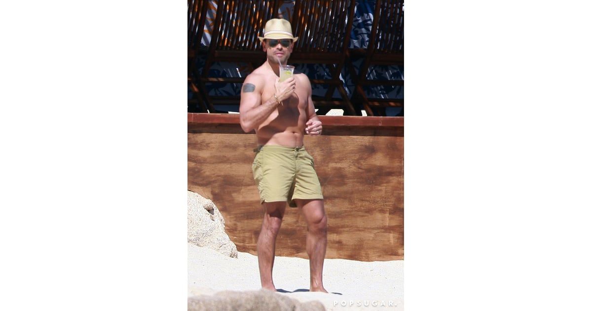 Mark Consuelos sipped a drink on the beach. Matthew Bomer Shirtless