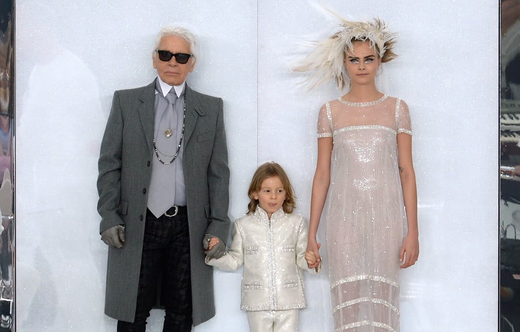 Cara Delevingne walked in the Chanel Haute Couture show with designer Karl Lagerfeld.