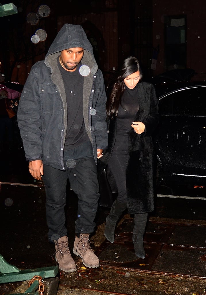 Kim Kardashian and Kanye West braved the rain in NYC on Saturday.