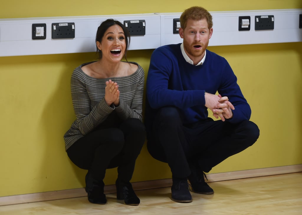 Meghan styled the check-print jacket with black pants and booties, while Prince Harry wore a cashmere Everlane sweater that we'd totally rock on a Winter day.
