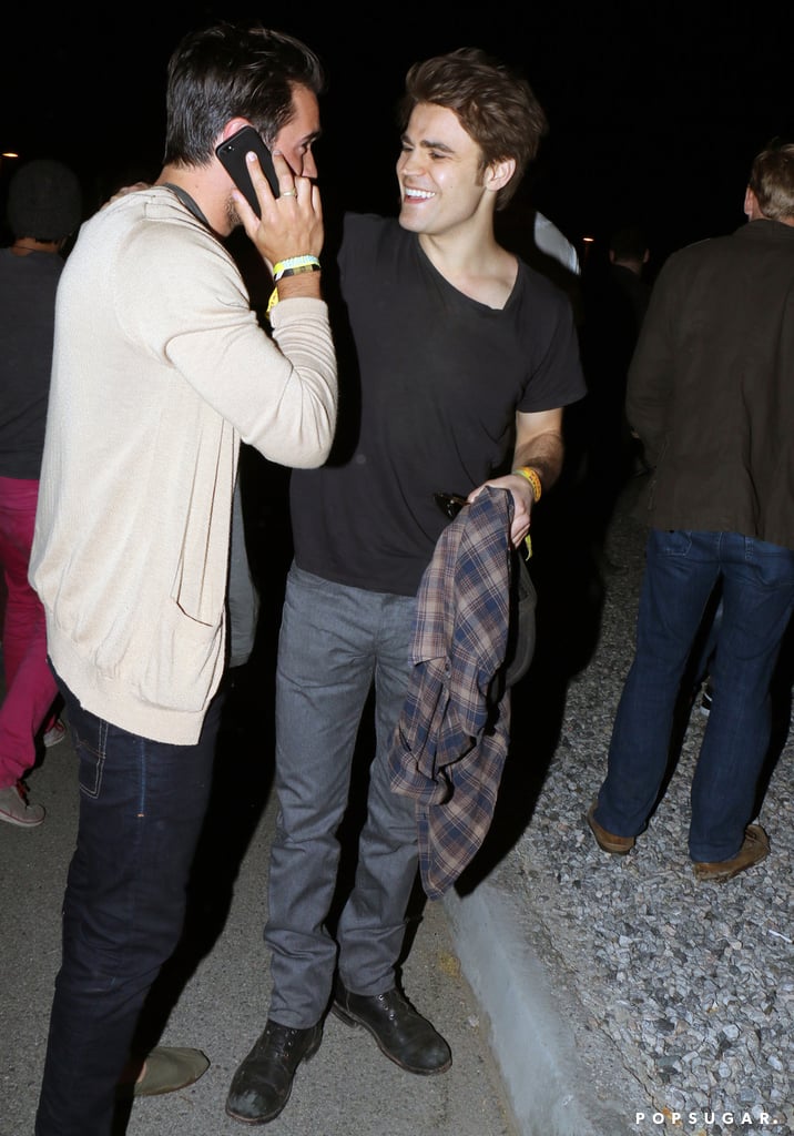 Paul Wesley laughed with a friend.