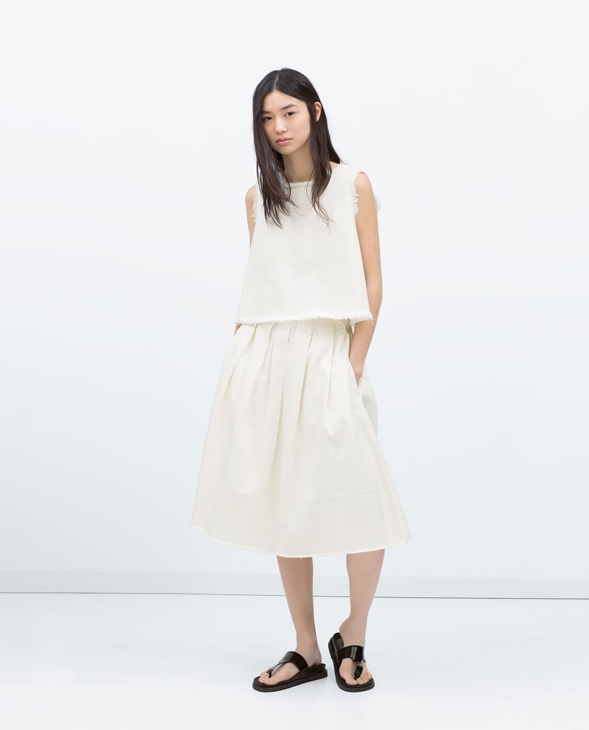 Low and behold, another awesome way to wear denim that has nothing to do with jeans. That's just the first thing I love about this Zara top ($50). The second? Those perfectly frayed edges. 
— Hannah McKinley, editor