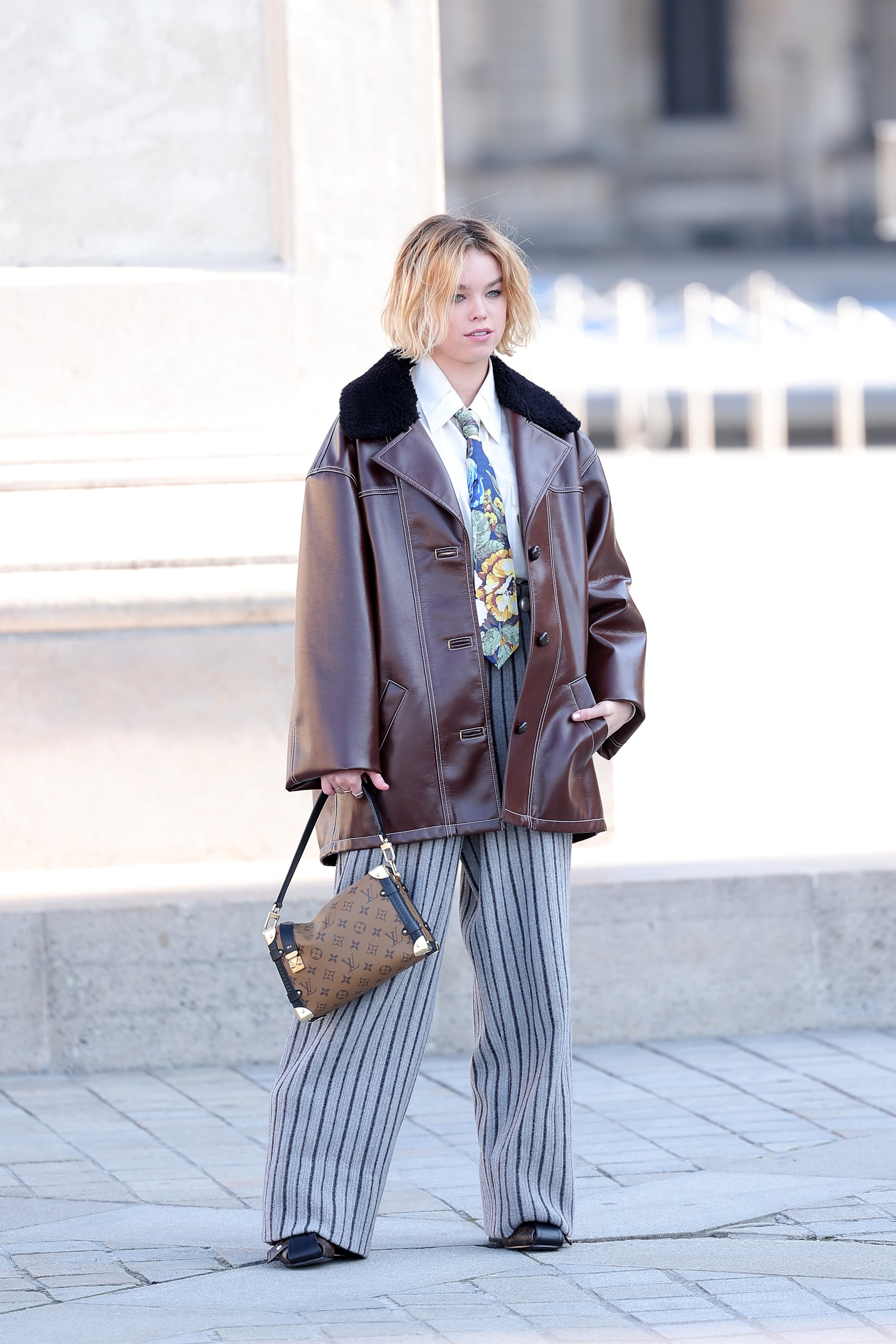 Milly Alcock Masters the 'Cool Dad' Look at the Louis Vuitton Show