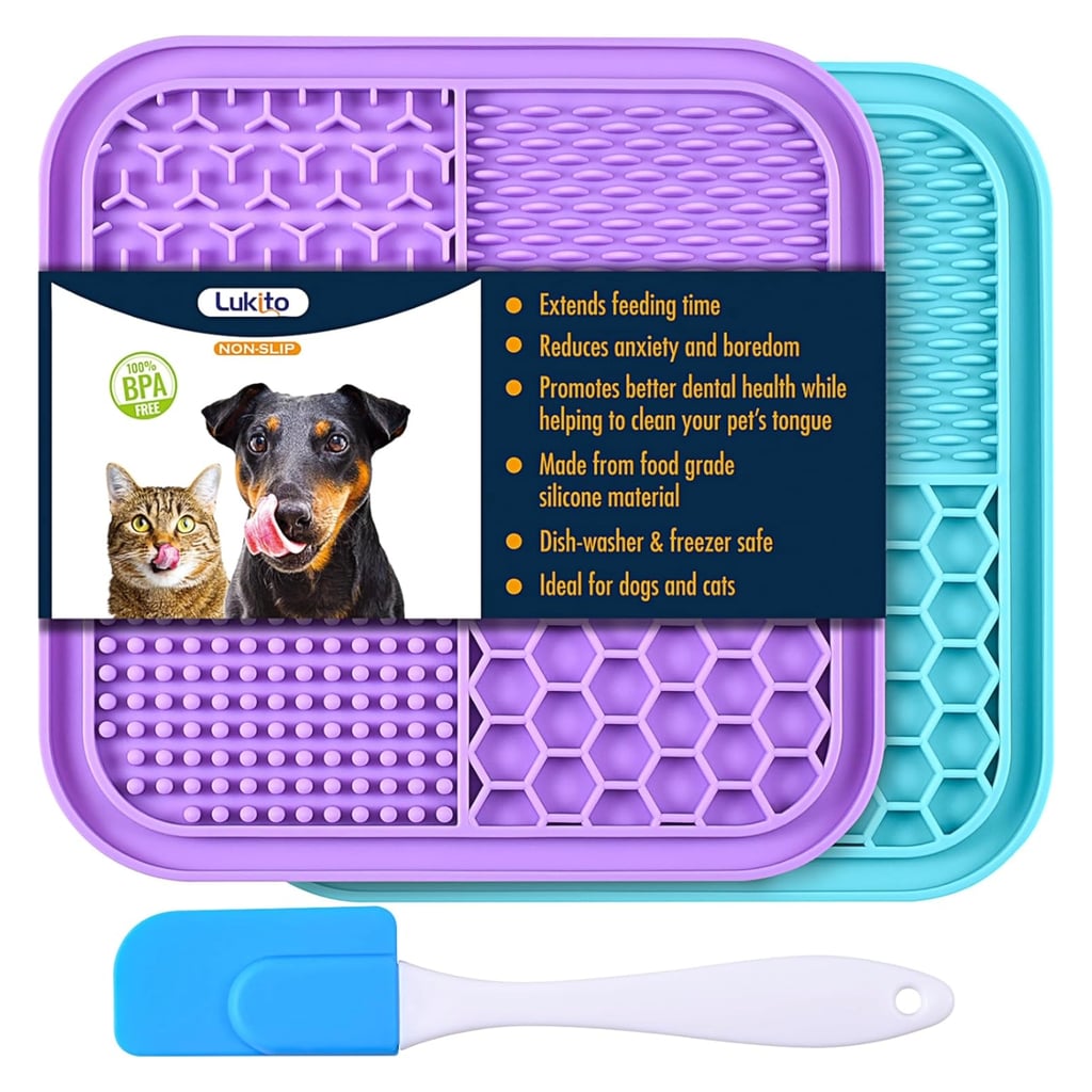 Lukito 2-Piece Licking Mat ($8)
These silicone lick mats are a must in our home. We like to fill them with canned pumpkin, yogurt, or peanut butter and give them to the dogs when they're most likely to feel anxious — whether we're stepping out of the house, having work done on our apartment, or attending a large family gathering. If your pup is spooked by bathtime, you can also suction a lick mat to the wall of the tub or shower as a good distraction.