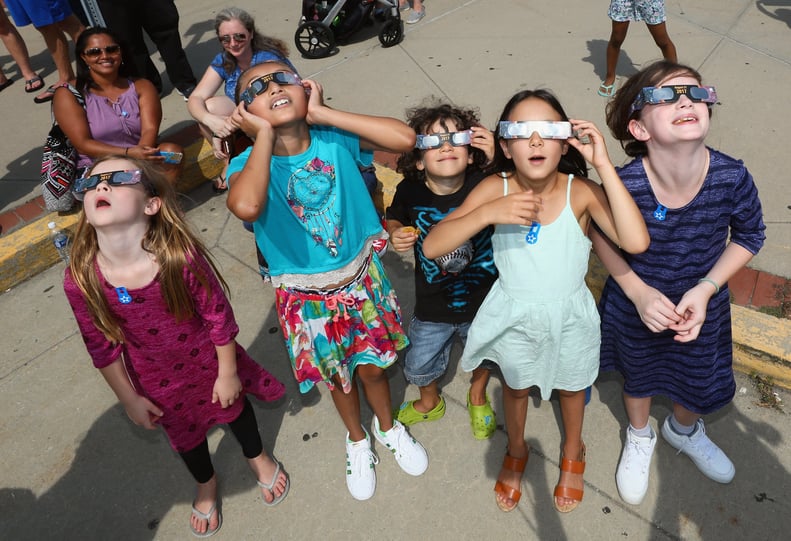 Kids look up at the Cradle of Aviation Museum in Garden City, NY.