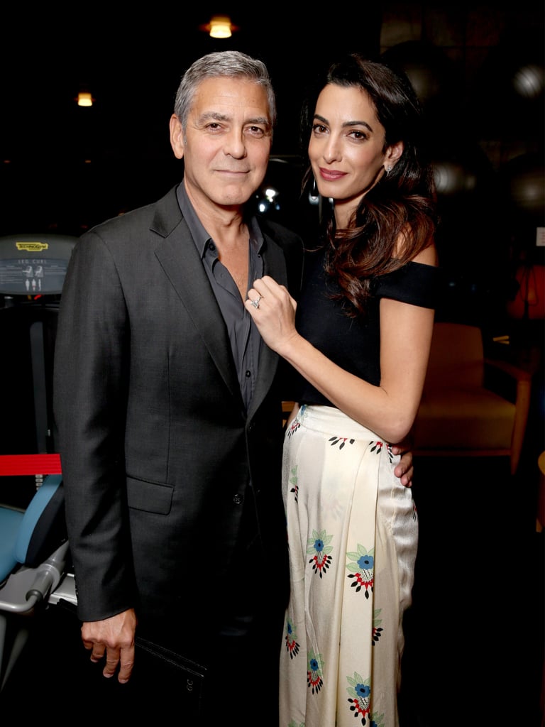 Amal's printed Ossie Clark pants feature a Celia Birtwell print from the '70s.