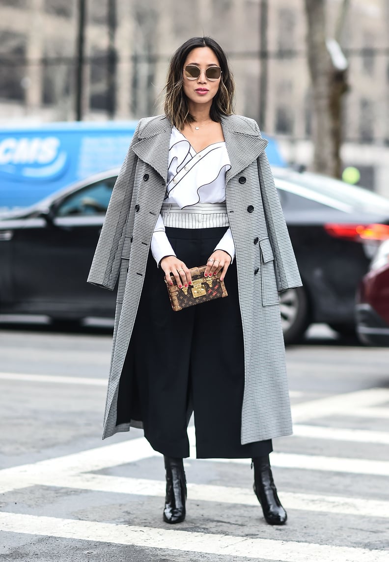 A Ruffled Top, Black Culottes, a Classic Coat, and Ankle Boots