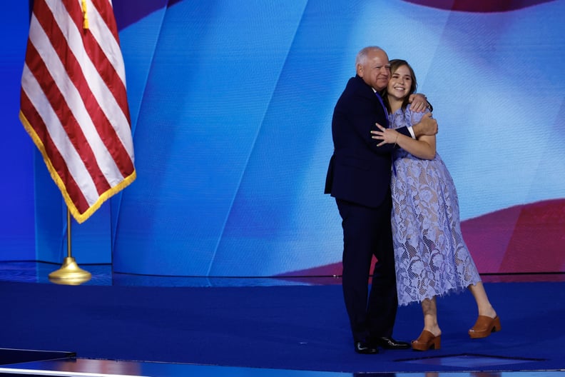  Democratic vice presidential nominee Minnesota Gov. Tim Walz celebrates with his daughter Hope Walz after accepting the Democratic vice presidential nomination on stage during the third day of the Democratic National Convent