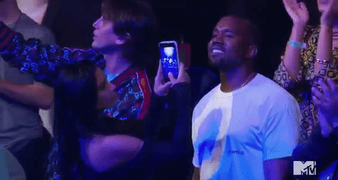 When He Smiled Sweetly at Rihanna During Her Performance