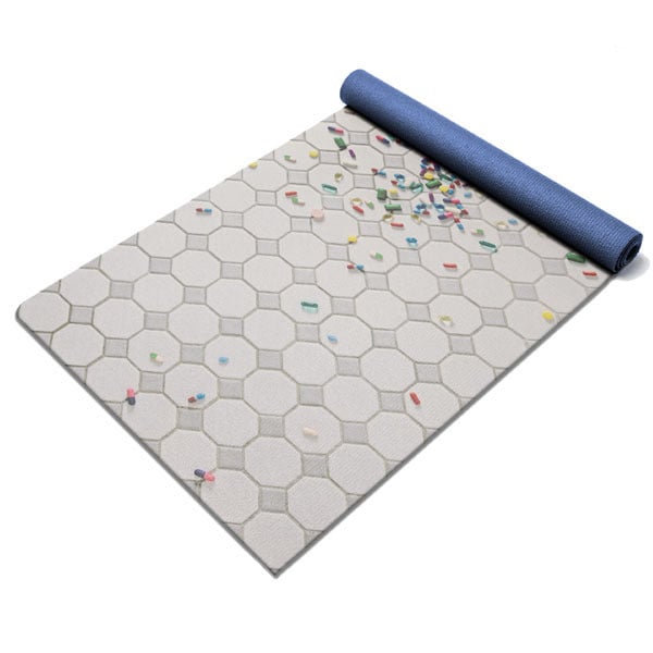 Yoga is known for its feel-good quality, which means the only pills she'll need are the ones on this Plank yoga mat ($85).