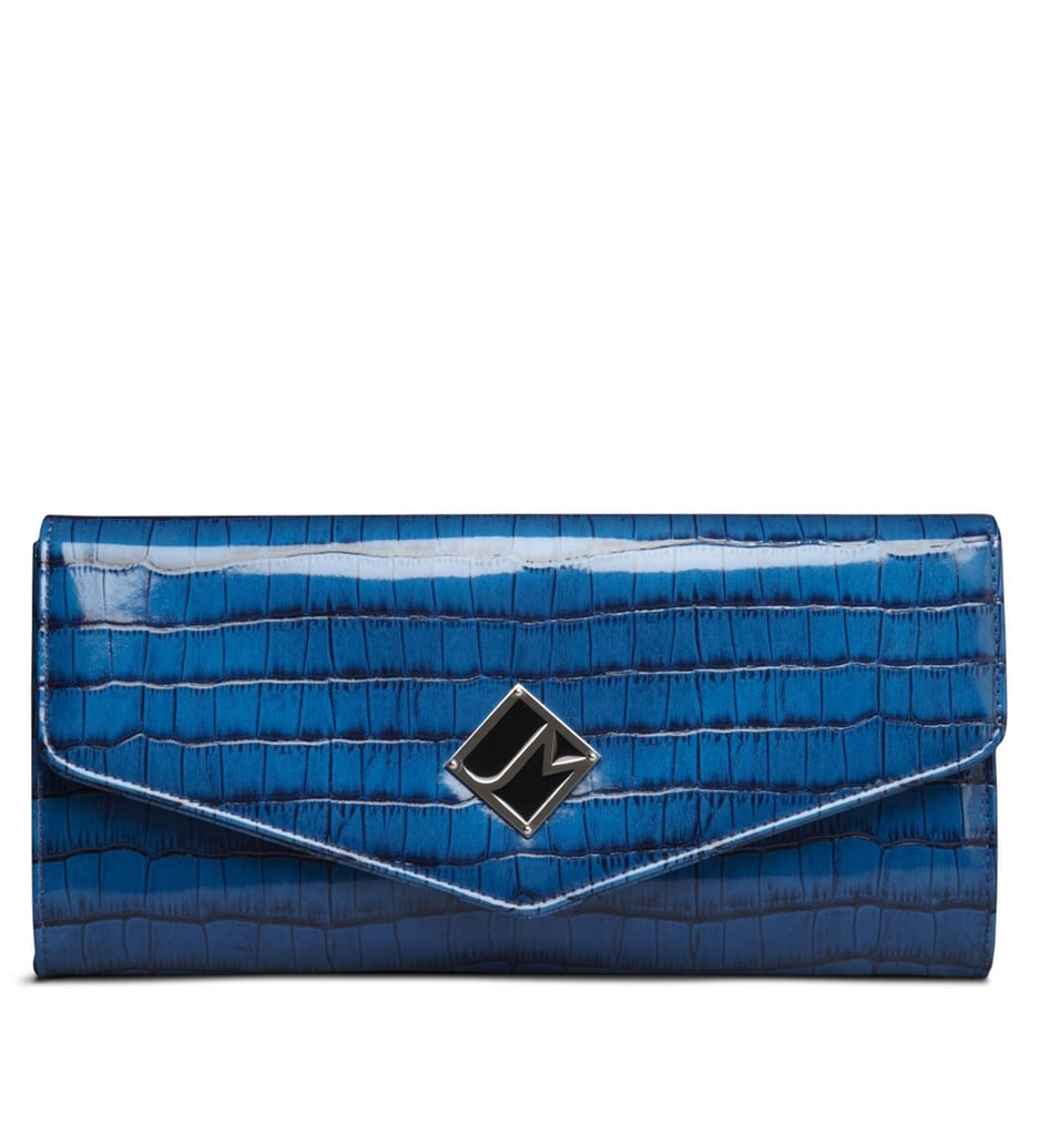 Jill Milan's beautiful clutches and handbags of faux leather and faux skins are all made in Italy. These are not exactly cheap, but they sure look posh and elegant. They are perfect to prove to the fashionista on your list that chic could be cruelty free.  
Jill Milan New Canaan Clutch Blue Faux Skin ($250)