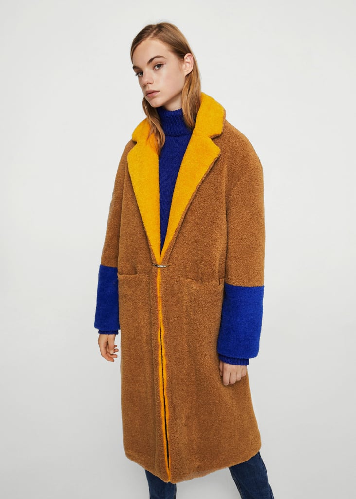Colorblocked and cozy, this Mango Contrast Faux Fur Coat ($130) is pretty much guaranteed to get you stopped on the street.