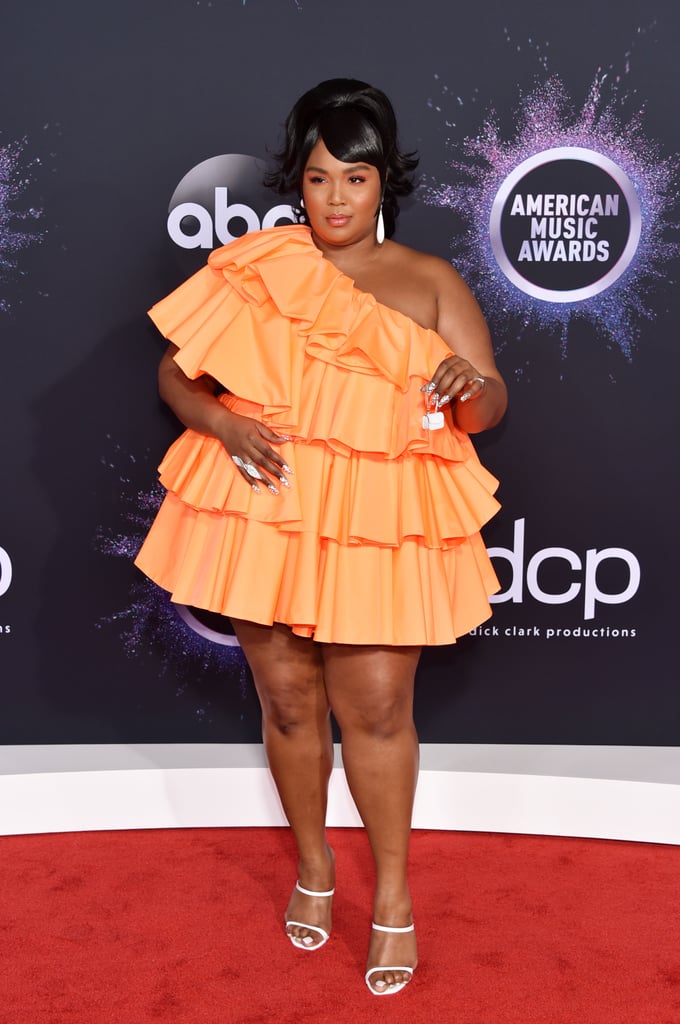 Lizzo's Miniature Valentino Bag and Orange Dress at the AMAs