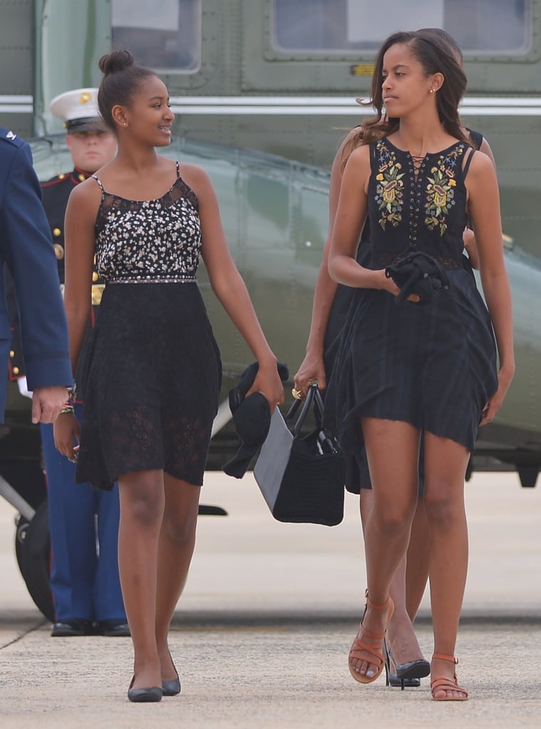Wearing an embroidered lace-up tank dress.