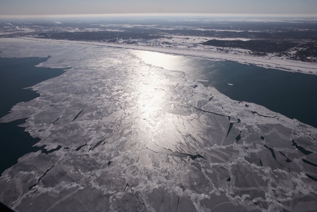 Ice can be seen covering Lake Michigan.