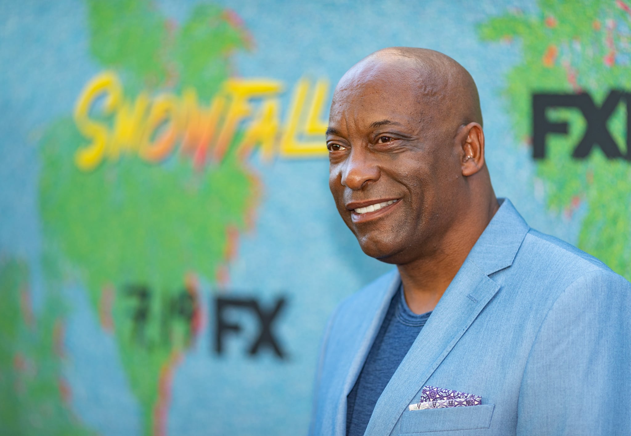 LOS ANGELES, CA - JULY 16:  John Singleton arrives to the premiere Of FX's 