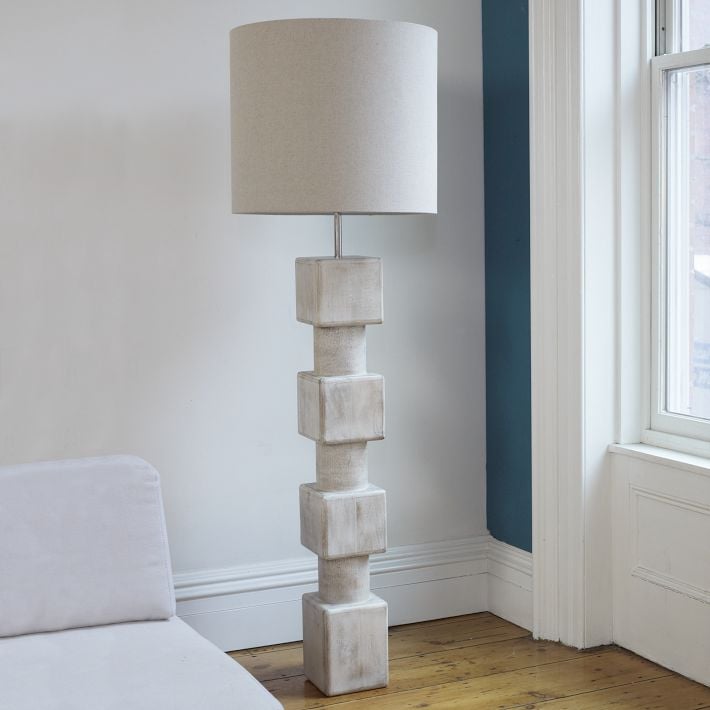 The Totem Floor Lamp ($400) is made from a whitewashed mango wood base with a linen shade
The Totem Floor Lamp ($400) is made from a whitewashed mango wood base with a linen shade