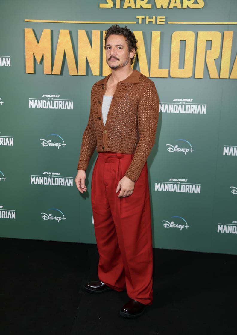 Pedro Pascal's Brown Knit Cardigan and Red Pants