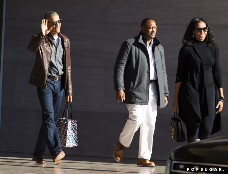 Here he is looking damn good while out on a leisurely stroll through Washington DC with Michelle.