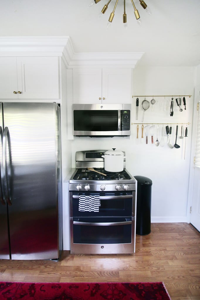 She decided to switch the order and also placed the microwave above the oven.