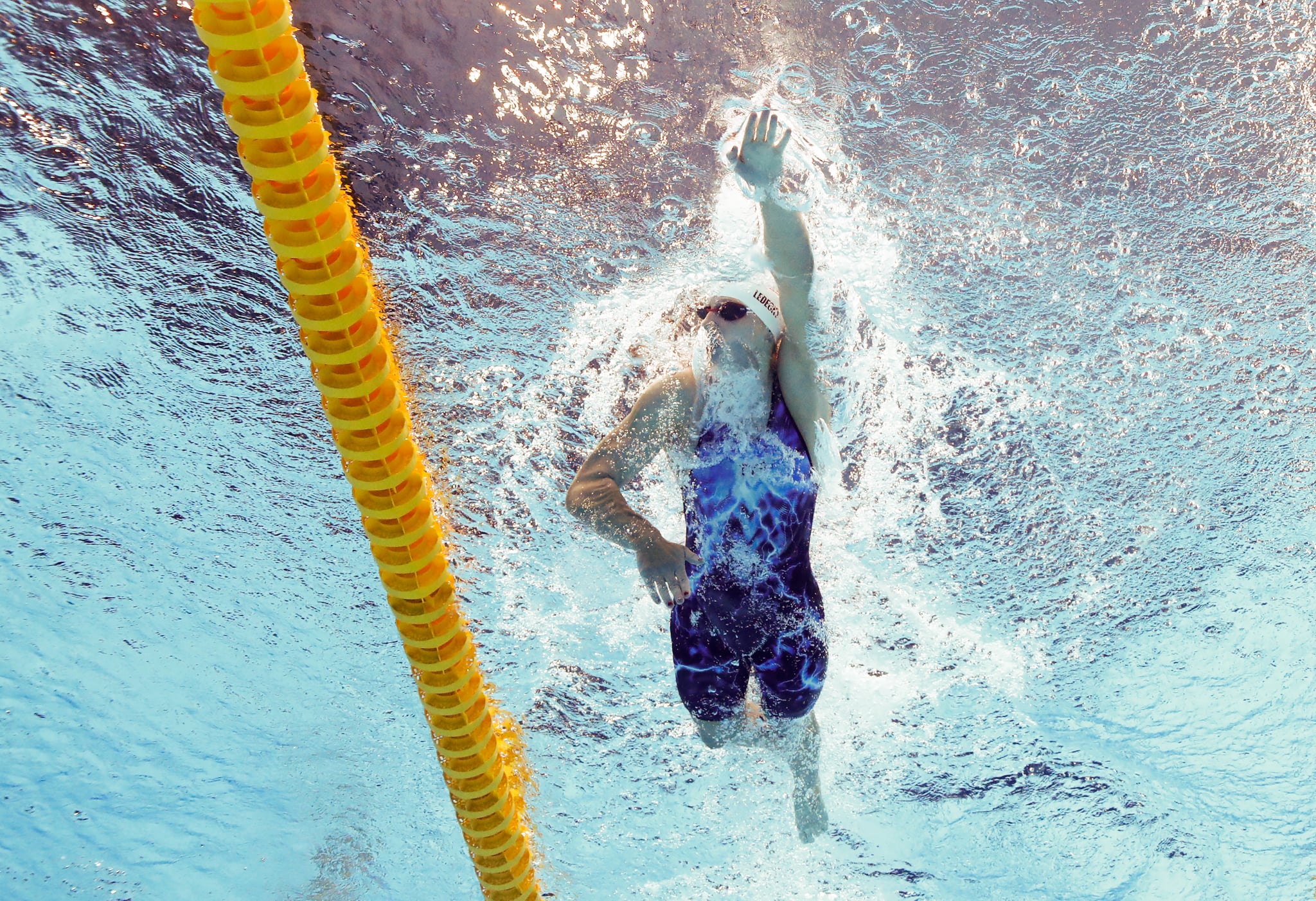 TOKYO, JAPAN - JULY 26: Katie Ledecky of Team United States competes in heat five of the Women's 1500m Freestyle on day three of the Tokyo 2020 Olympic Games at Tokyo Aquatics Centre on July 26, 2021 in Tokyo, Japan. (Photo by Al Bello/Getty Images)