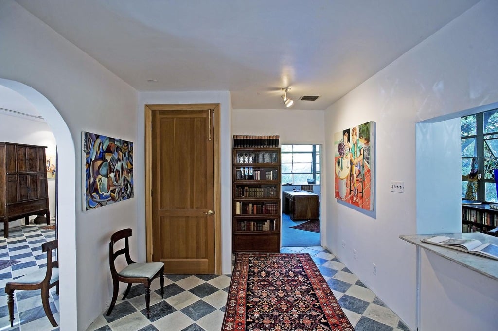 Classic checkered floors can be seen throughout a large portion of the home.
 Source: Everett Fenton Gidley