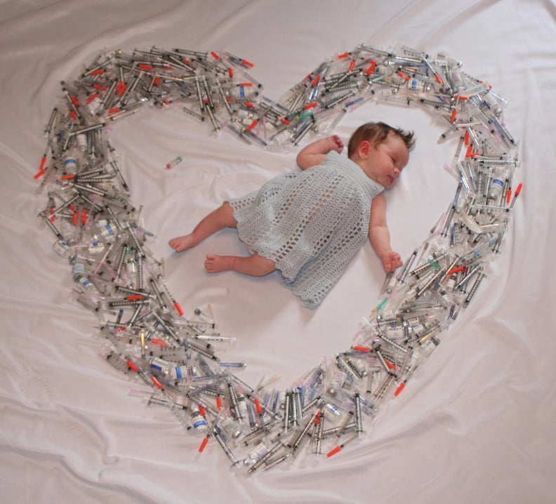 This Viral Photo of a Baby Surrounded by Syringes