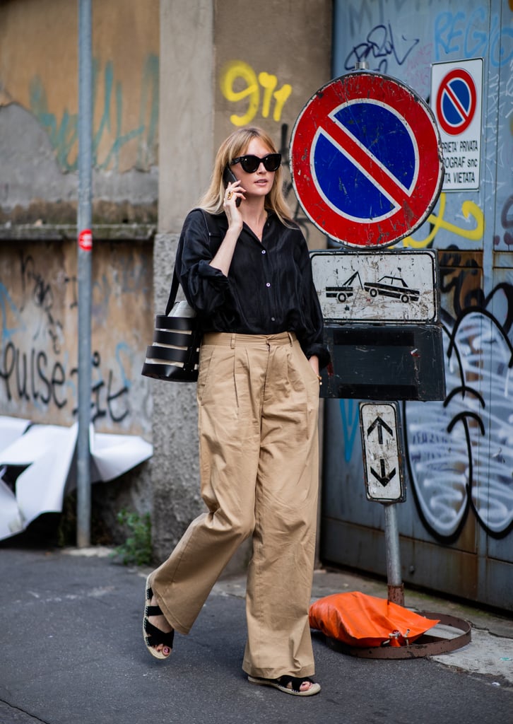 Give high-waist, wide-leg pants a Summer spin with comfortable sandals and a linen shirt.