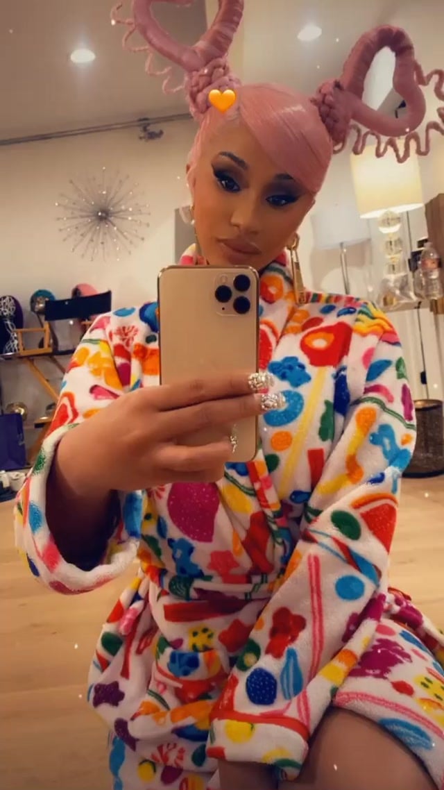 Cardi B is spicing up her life with a throwback hairstyle. The rapper  posted an image to Instagram wearing half-up pigtails courtesy of a…