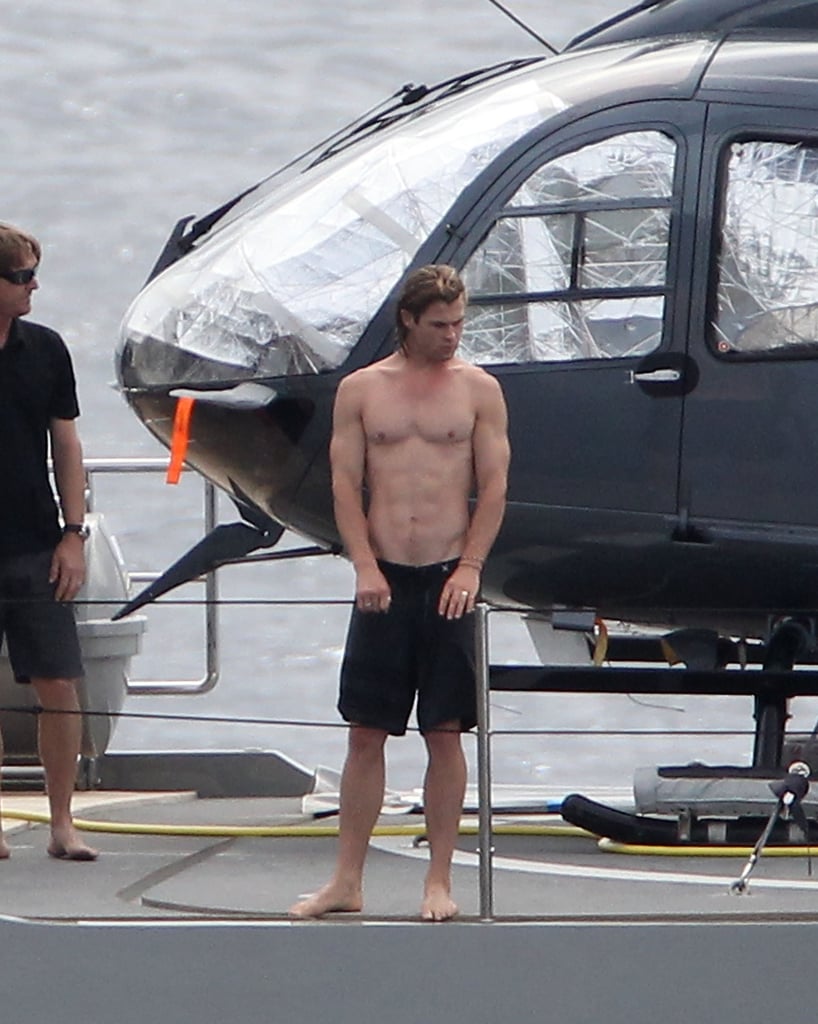 Chris Hemsworth showed off his abs while having fun on a yacht with wife Elsa Pataky and Matt Damon in St. Barts in January 2012.