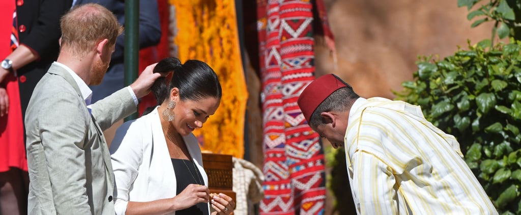 Prince Harry Helps Meghan Markle Fix Her Hair in Morocco, and the World Swoons