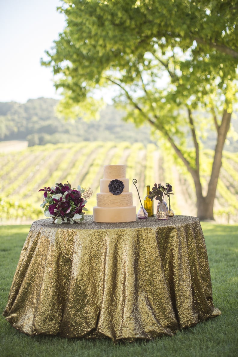 Serve the cake on its own glittery table.